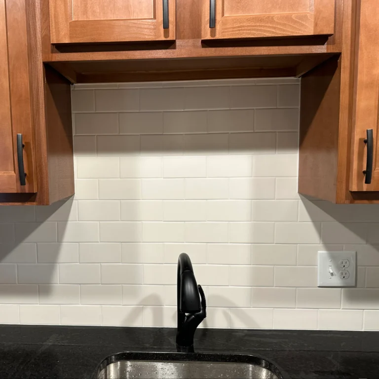 White rectangular backsplash tiles.