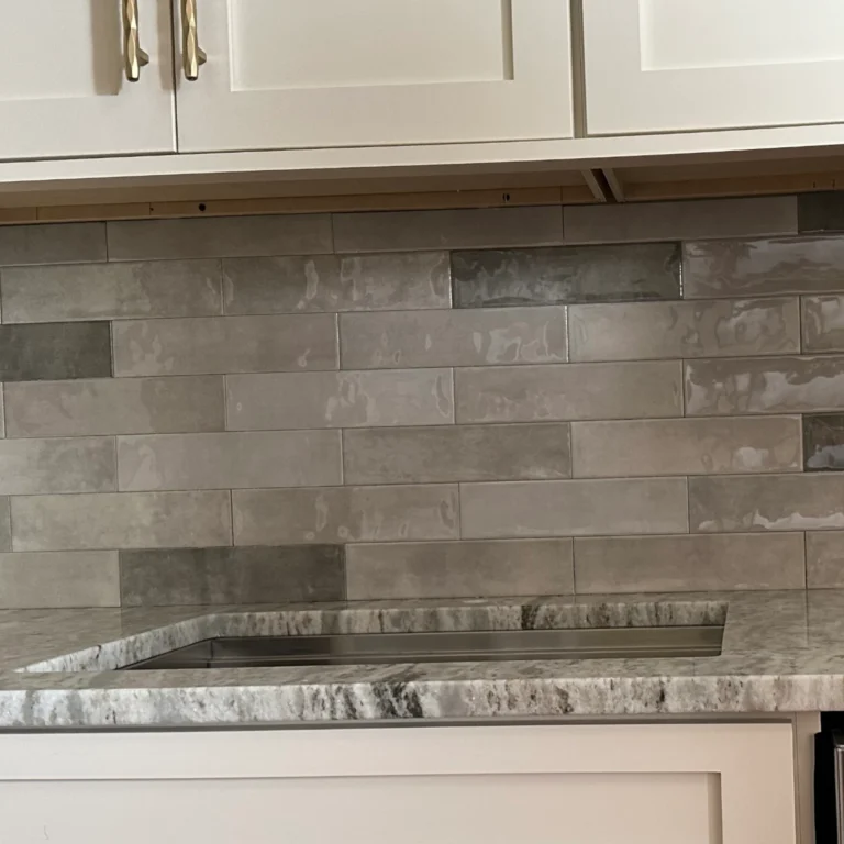 Shiny stone tile backsplash tile.